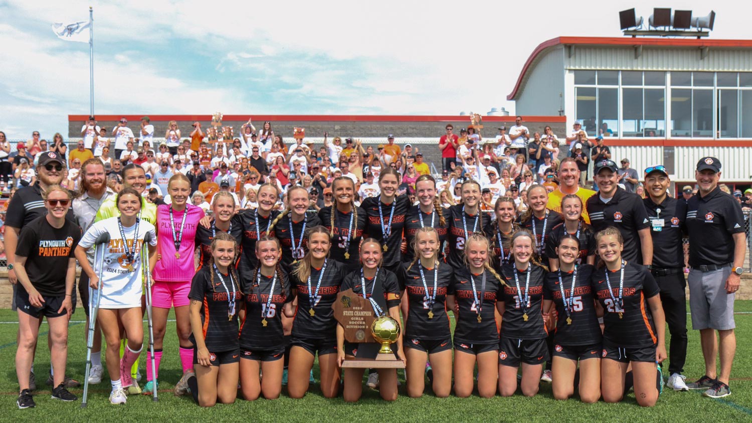PHS Girls Soccer team with trophy