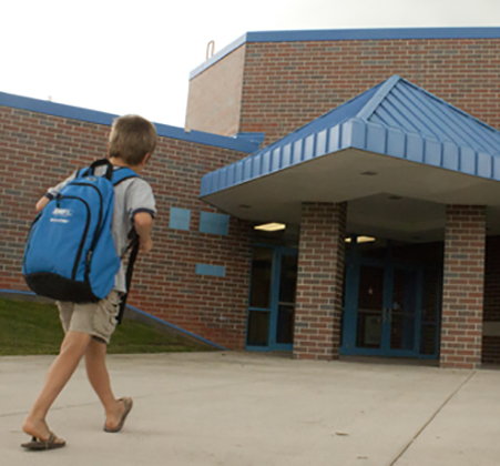 Student walking into Horizon