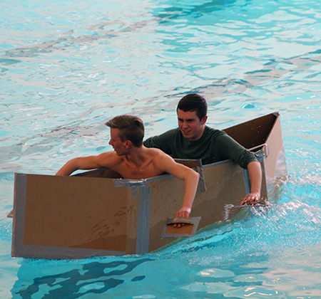 cardboard boat in pool
