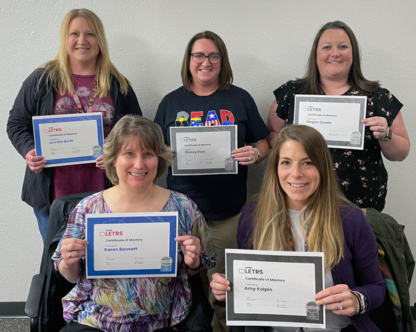 5 teachers with with certficates