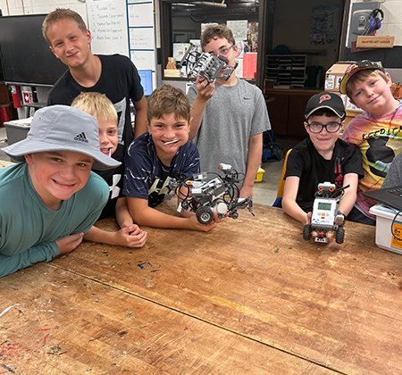 students with robots