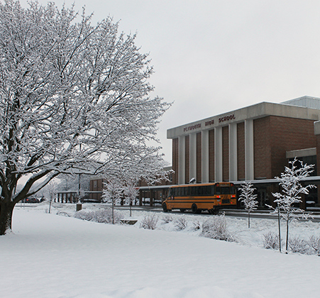 school bus outside snow-covered PHS