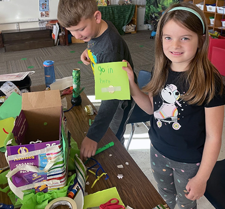 students with leprechaun trap