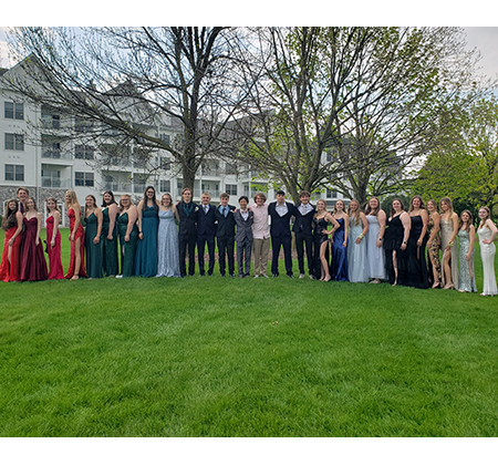 students in prom attire outside the Osthoff