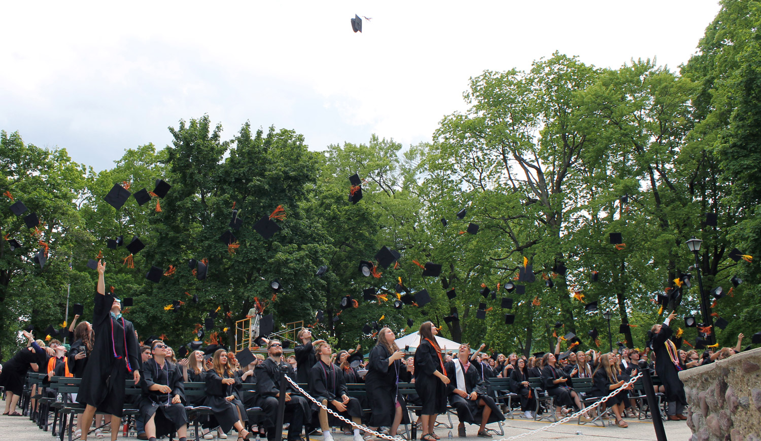 grads tossing caps