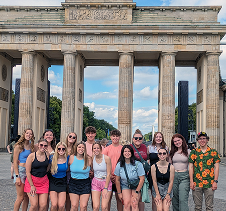 group in front of Brandenburg Gate