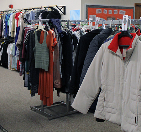 clothes hanging on racks
