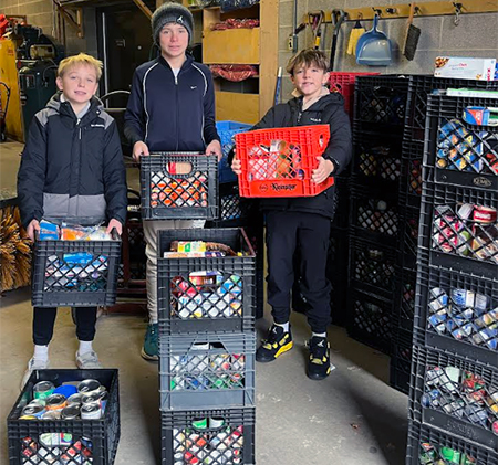 Riverview students with crates of food