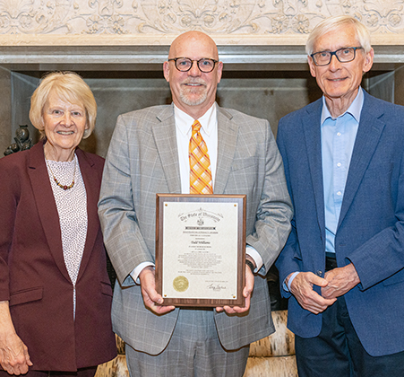 3 people with certificate