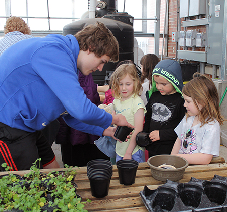 students in greenhouse