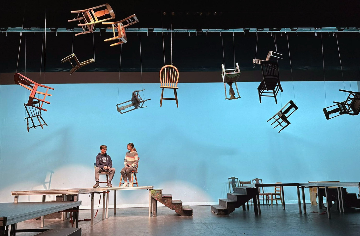 chairs hanging over stage