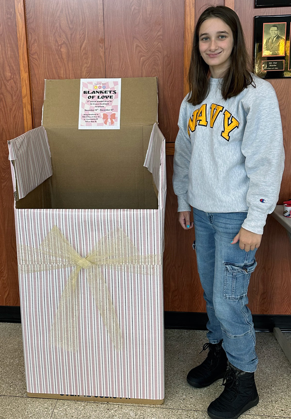 student with donation bin