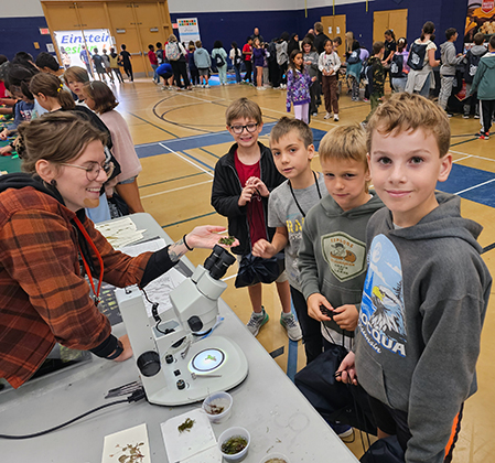 students with microscope