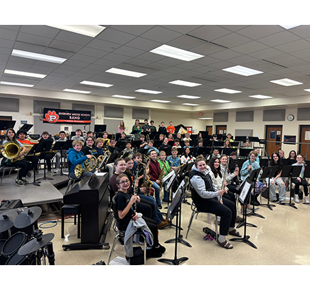 students holding instruments