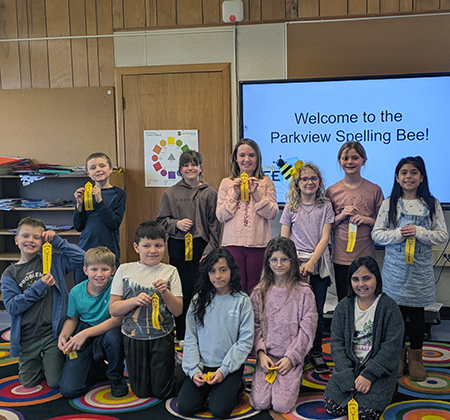 Parkview bee participants holding ribbons