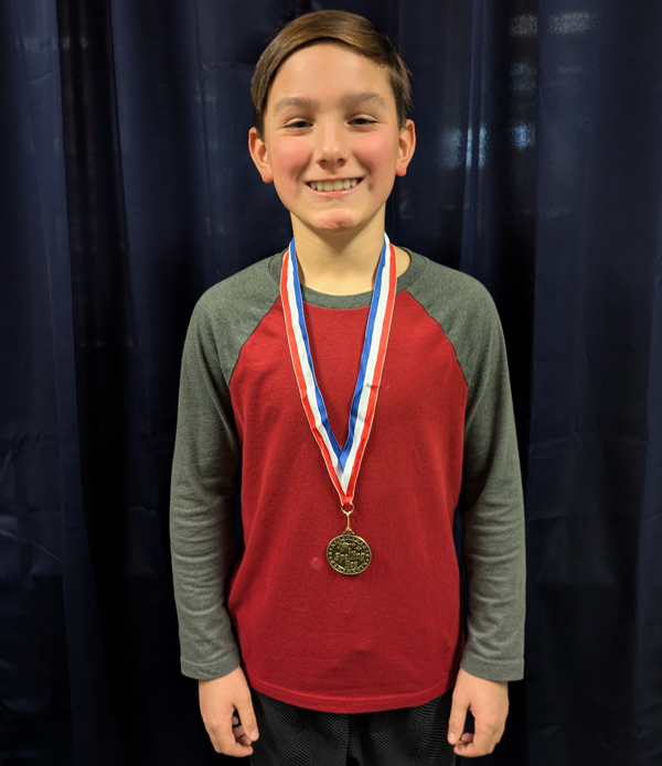 Riverview student wearing medal