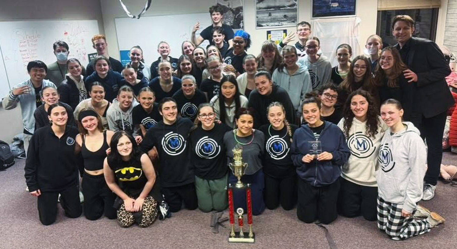 group photo with trophy
