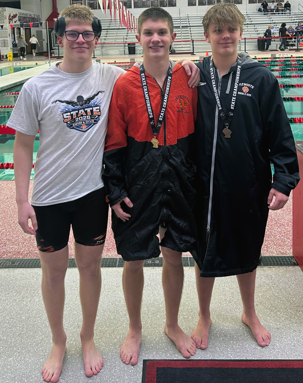3 PHS divers in front of pool