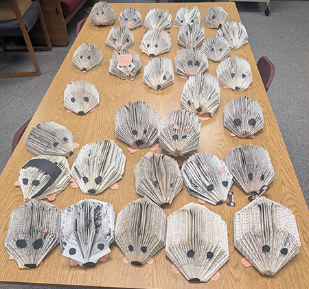 books folded into hedgehogs