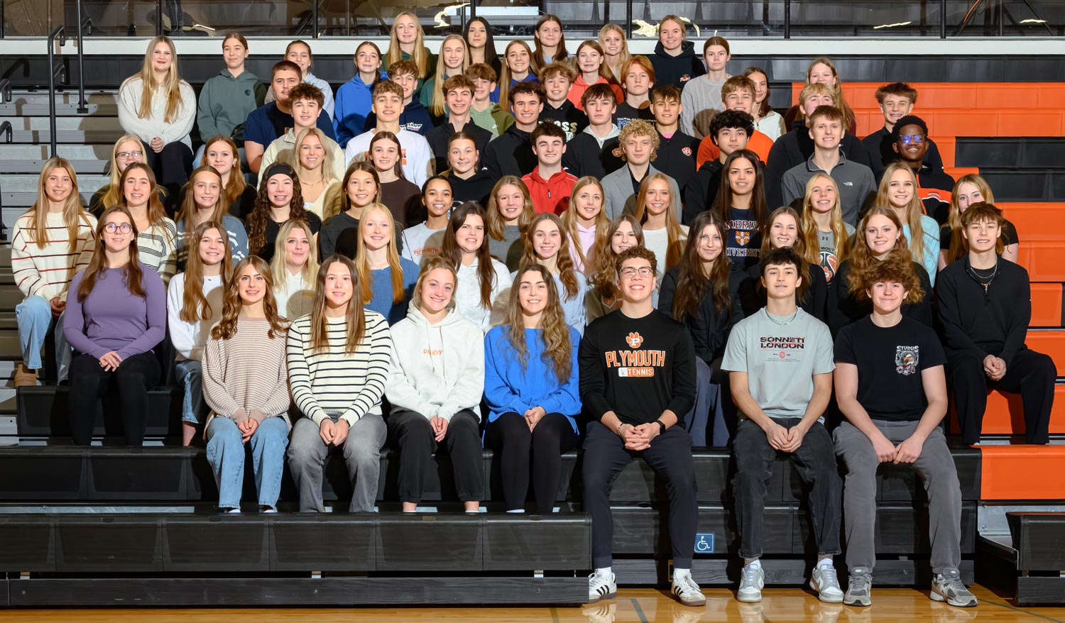 group photo on gym bleachers