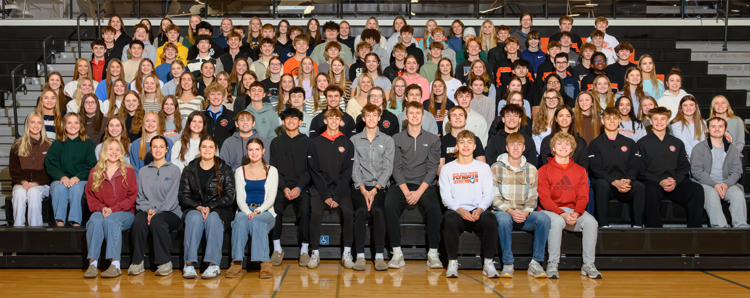 group photo on gym bleachers