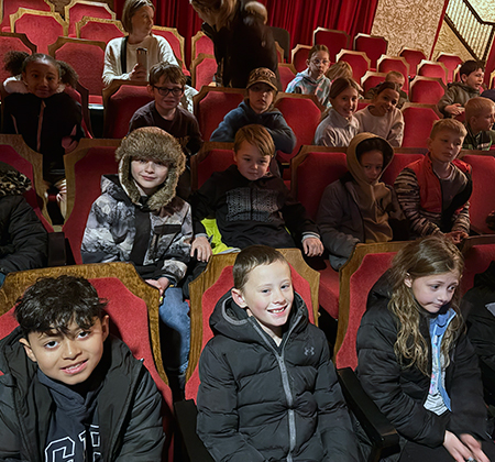 students seated in Weill Center auditorium