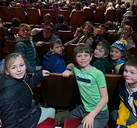 students seated in Weill Center auditorium