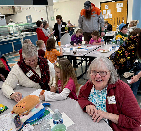 grandparents and students in cafeteria