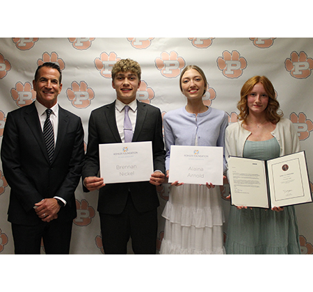 presenter with 4 students holding certificates
