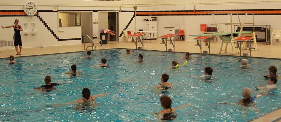 people exercising in pool
