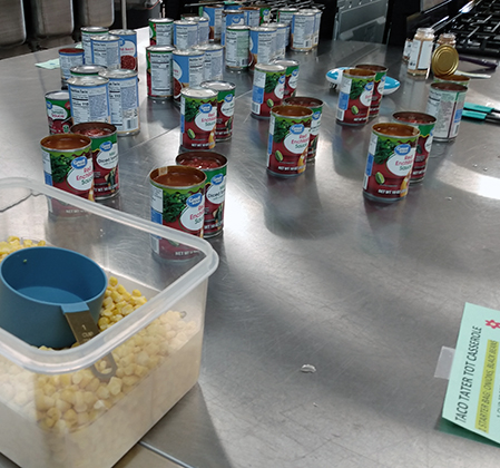 rice and cans of tomatoes