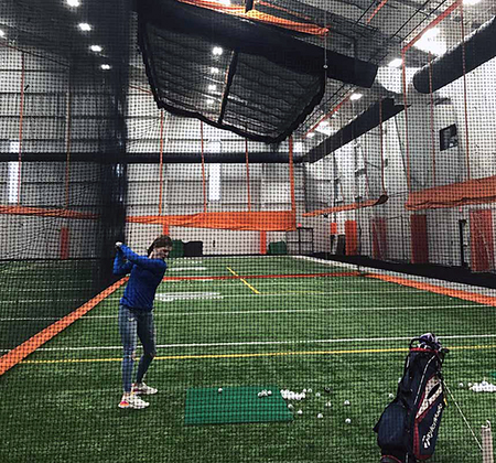 golfer in multipurpose facility