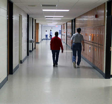 people walking in PHS hallway