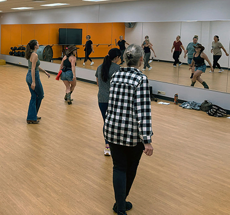 people line dancing in PHS Studio