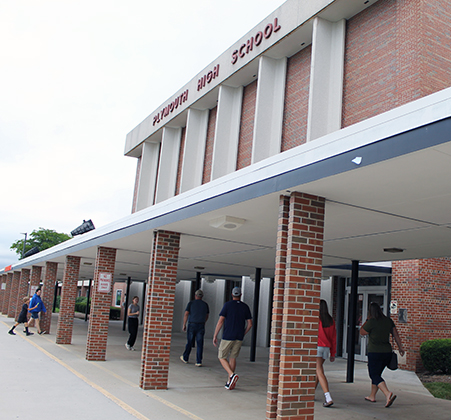 family walking toward PHS