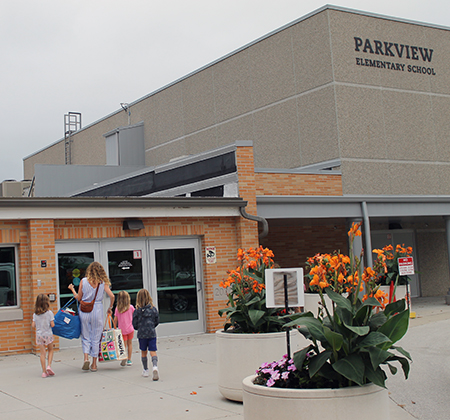 family walking into Parkview
