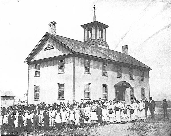 Students lined up in front of expanded school