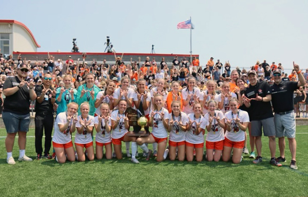 PHS Girls Soccer team with trophy